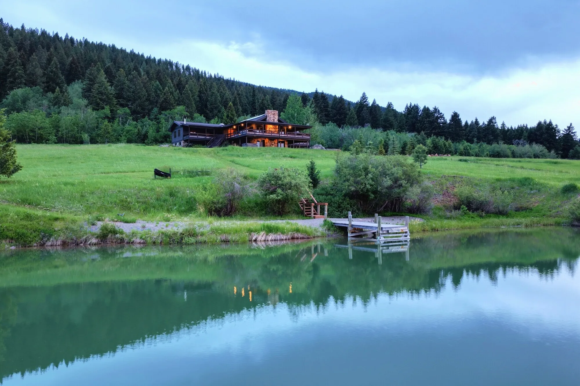 The pond and lodge against the treeline