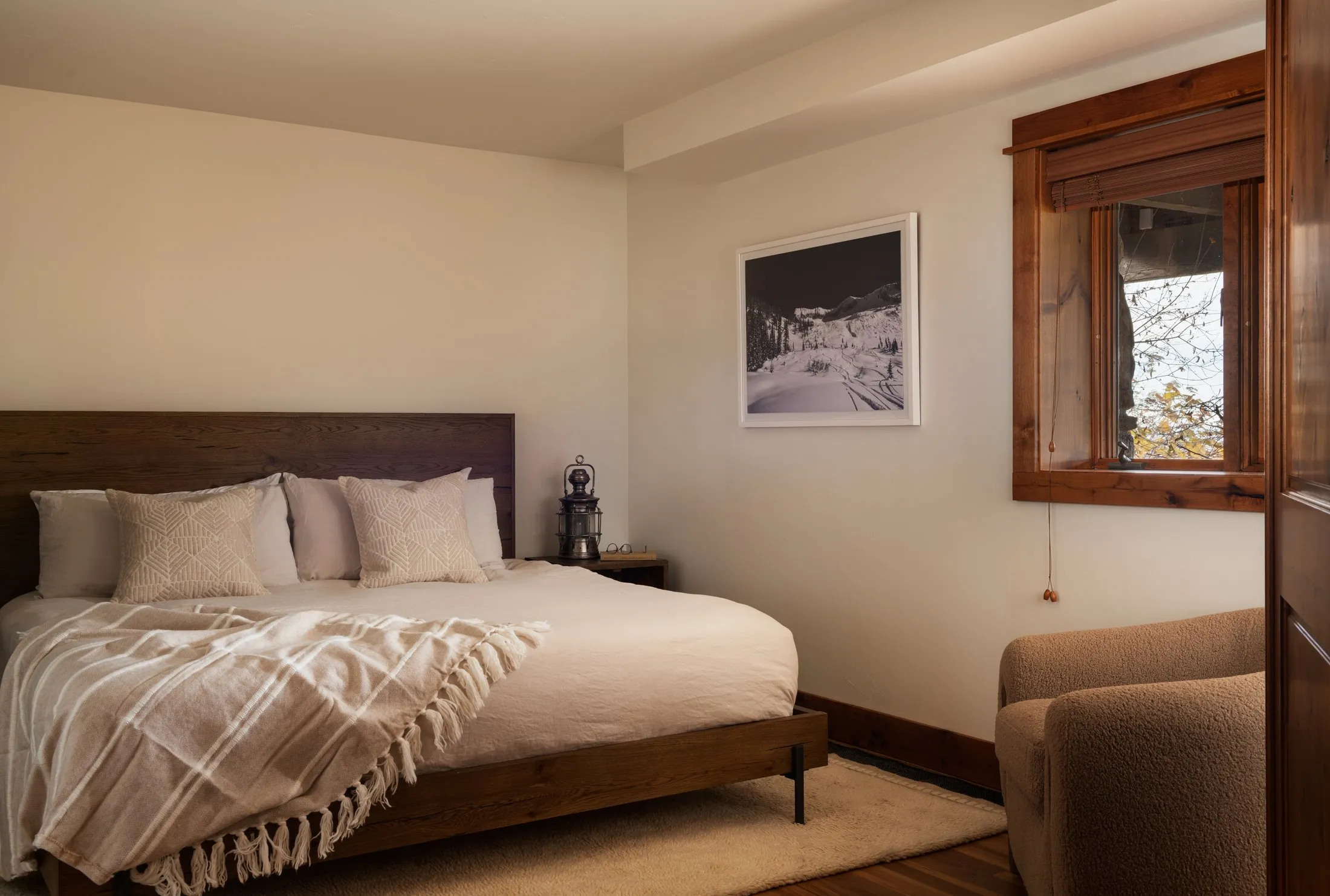 Ensuite apartment bedroom with king bed - lower level
